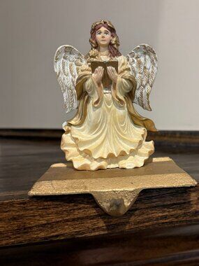 Vintage cast iron angel stocking holder, 5" tall